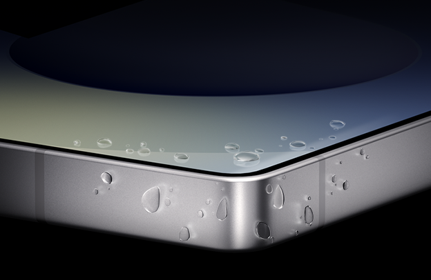Close up of the corner of Galaxy S25 Ultra with water droplets on the titanium frame.