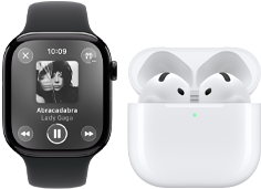 Apple Watch Series 11, titanium slate case, band: black sport band, Apple Music app open, paired with AirPods 4