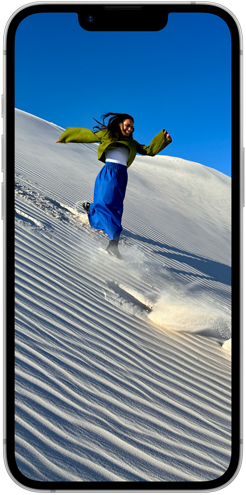People walking down a sand dune on iPhone 16e Super Retina XDR Display